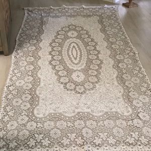 Off white with beige lace table cloth.